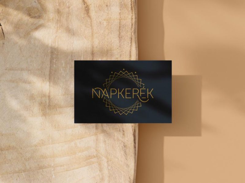 zenei együttes logójának grafikai látványterve napkerék felirattal
