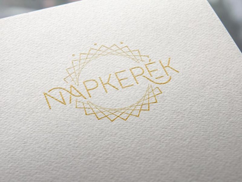 zenei együttes logójának grafikai látványterve napkerék felirattal